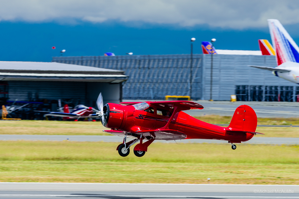 The Historic Flight Foundation's Beechcraft Staggerwing D17S takes off at Paine Field in Everett, Washingtion.